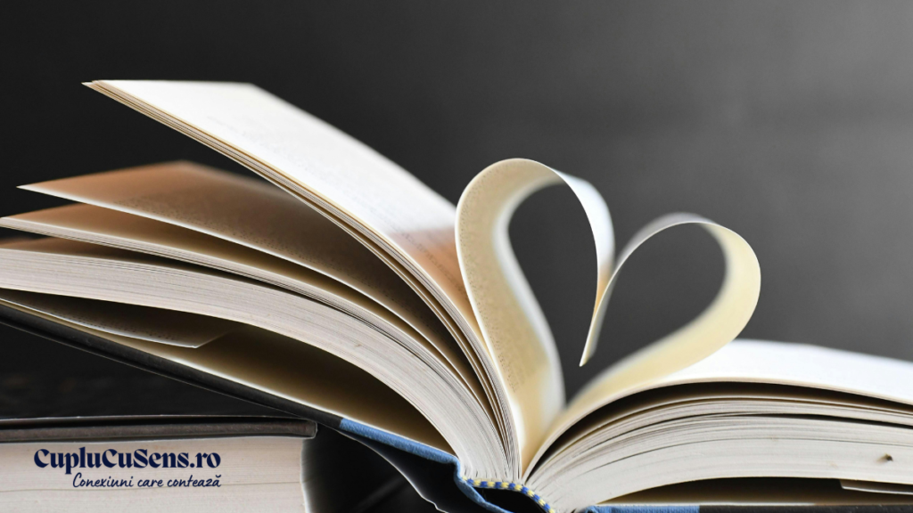 Cărți deschise cu pagini în formă de inimă, imagine folosită pentru articol despre test compatibilitate cuplu și compatibilitate reală în relație.